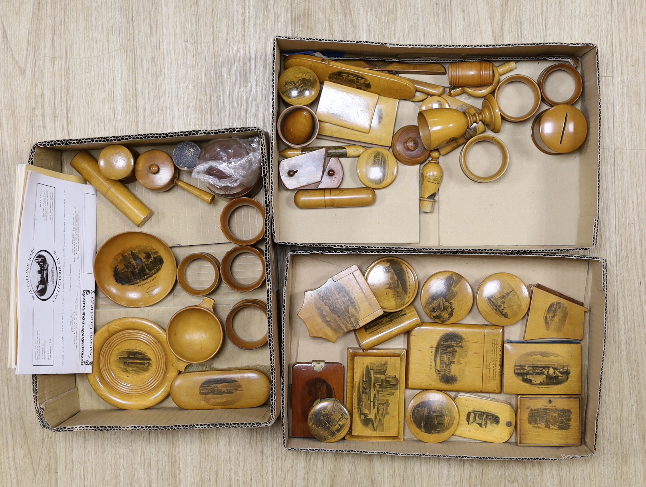 A collection of mixed Mauchline wares Including napkin rings and miniature boxes